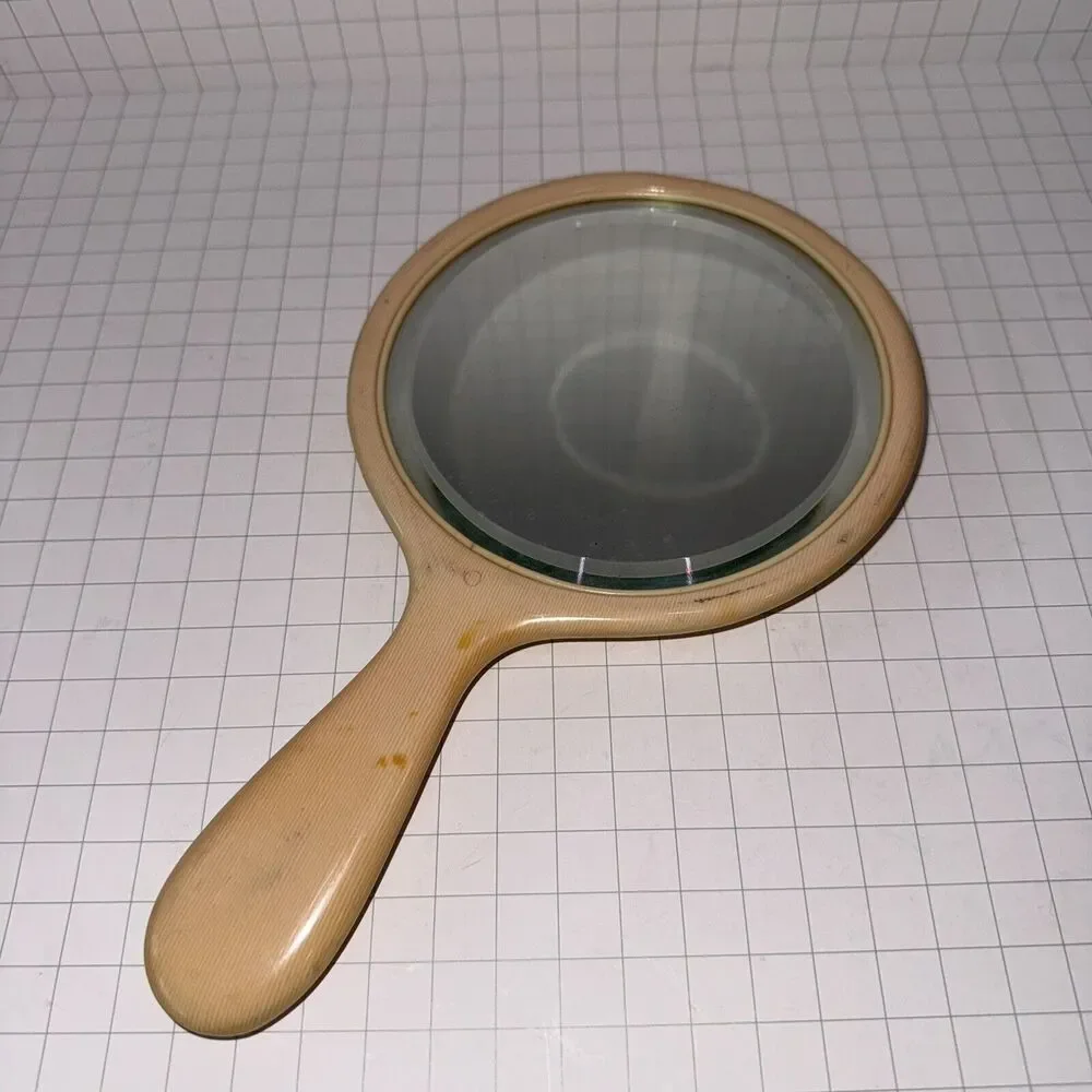 Vintage Art Deco Beveled Oval Celluloid Hand Mirror 9.5” approx Ivory Yellow
